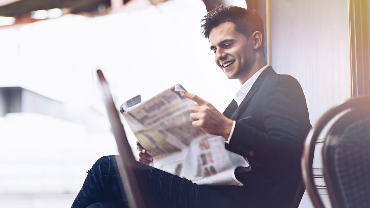Businessman is reading newspaper 2021 09 02 14 44 59 utc