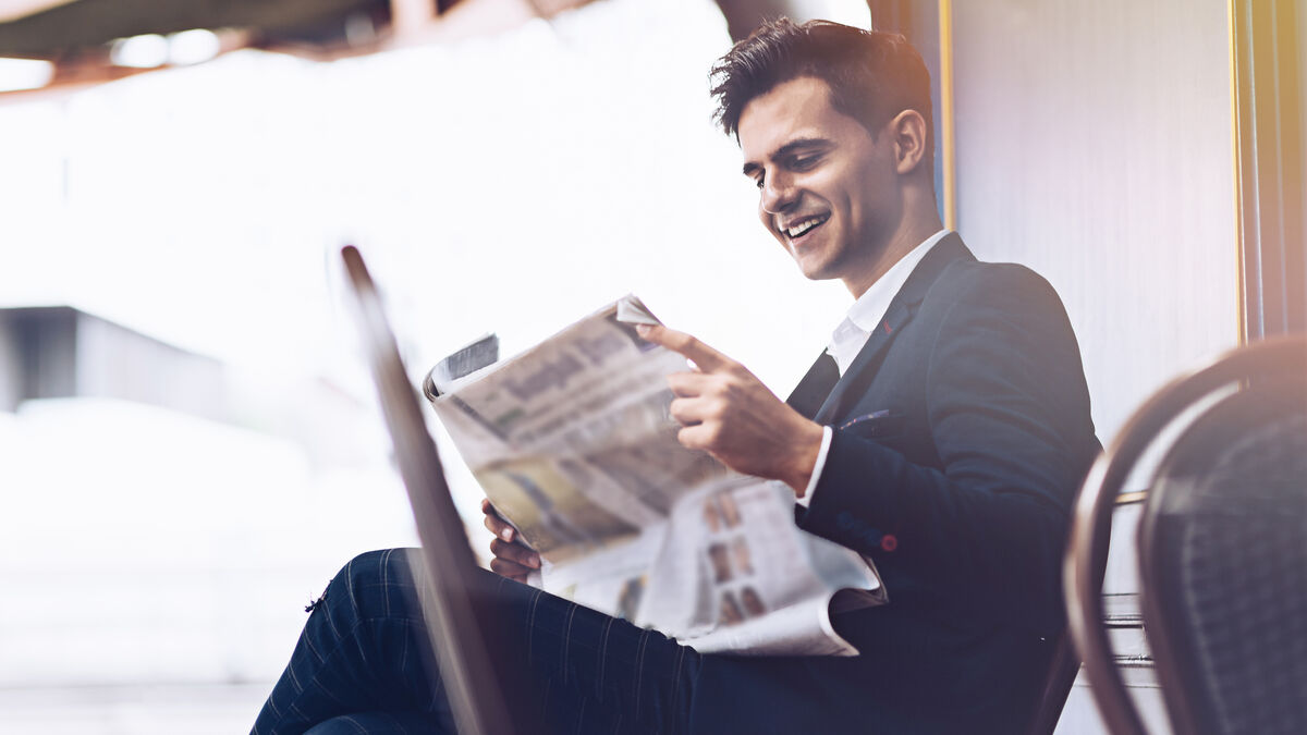 Businessman is reading newspaper 2021 09 02 14 44 59 utc