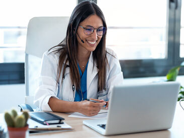 Female doctor talking with colleagues through a vi 2022 12 15 18 17 16 utc