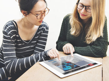 Women friendship digital tablet news networking co 2022 12 15 23 49 44 utc